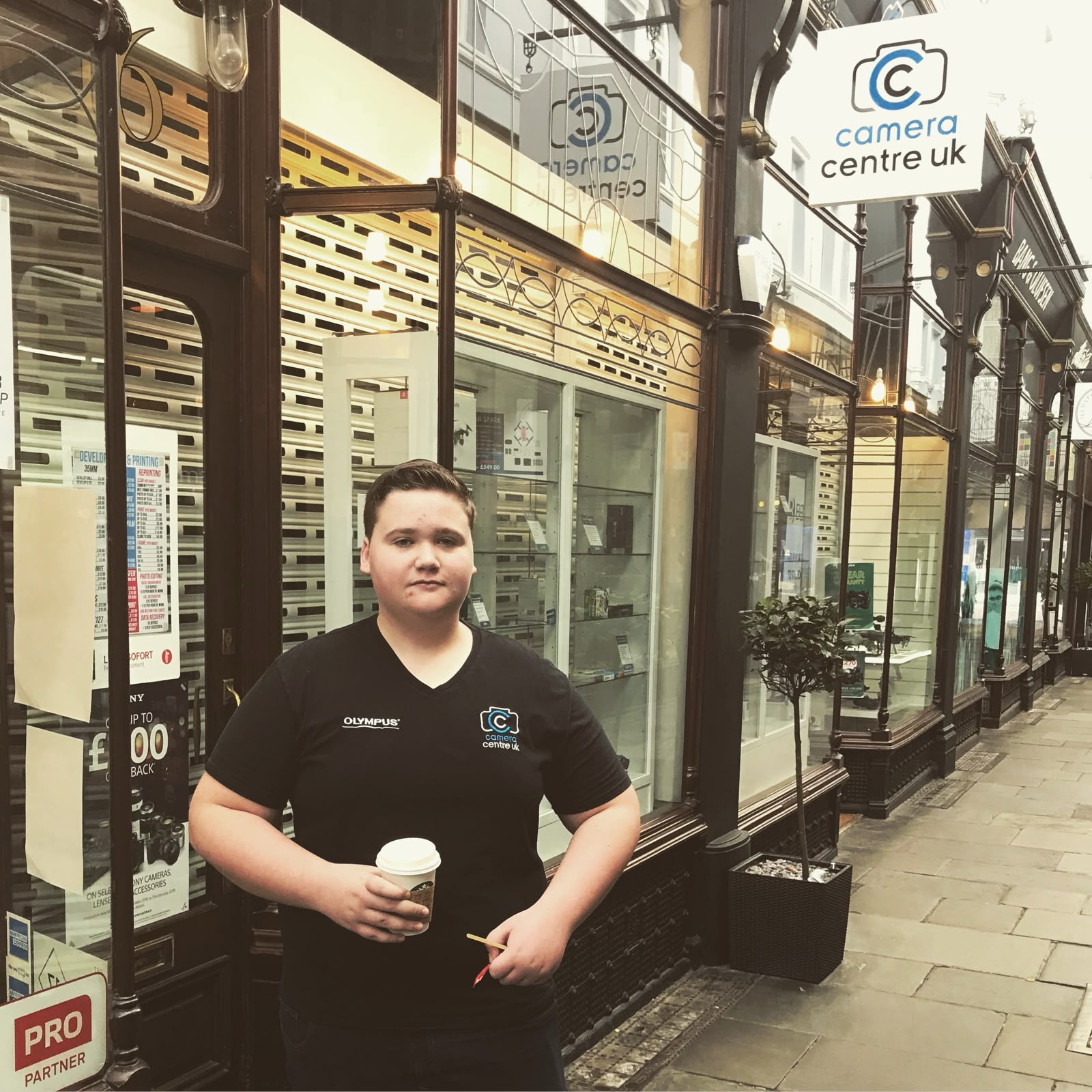 Mason on his first day working at the Camera Centre UK store in Morgan Arcade, Cardiff